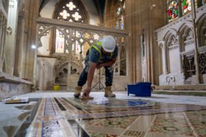 Salford-Cathedral---floor-restoration-man-at-work