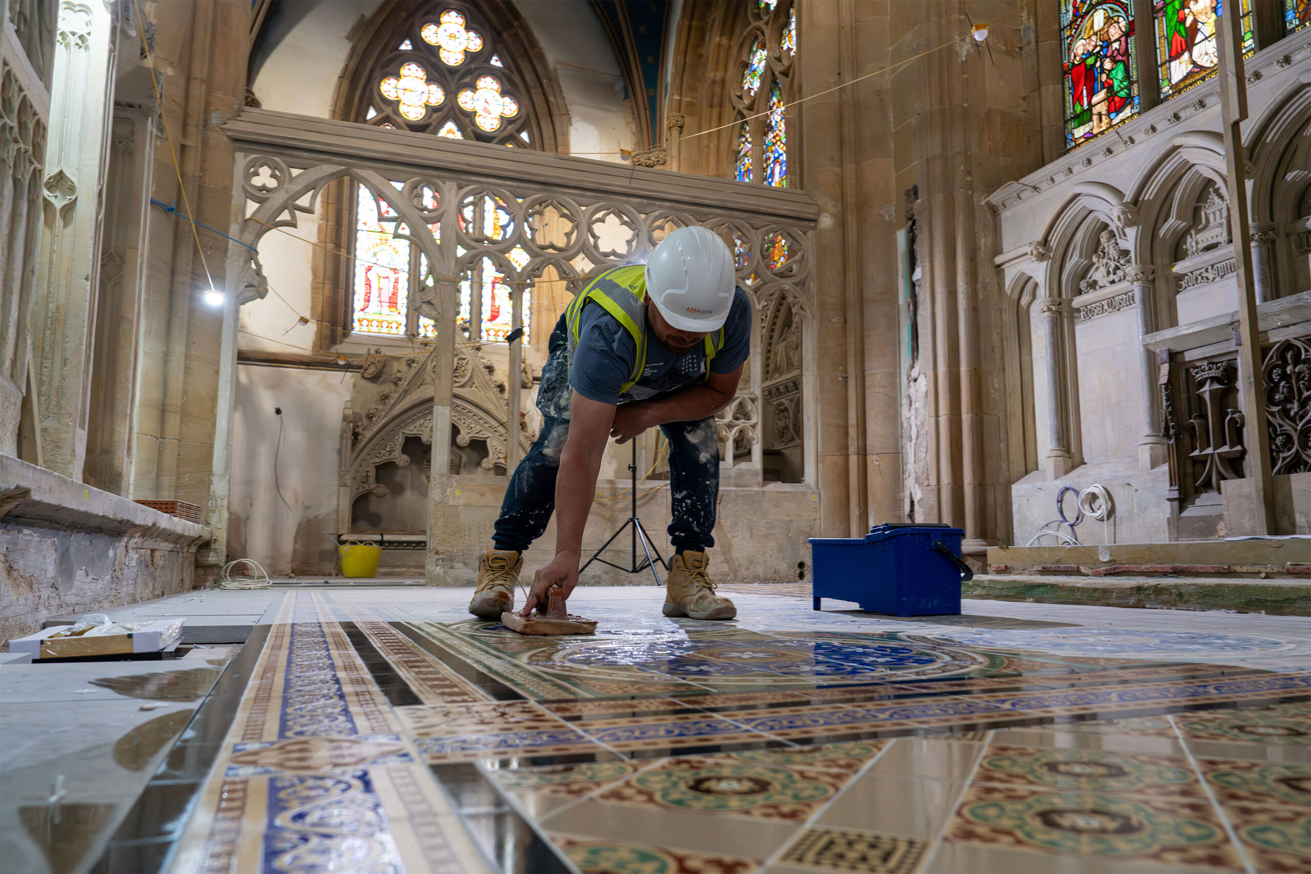Salford-Cathedral---floor-restoration-man-at-work